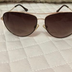 Sunglasses one Mk  and one Mark